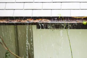 Flooding Clogged Gutters - South Shore Window Cleaning